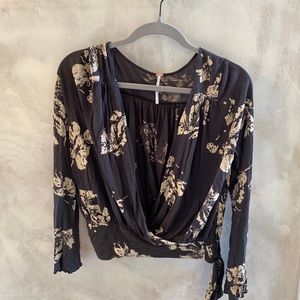 Free People long sleeve top with bell sleeves.